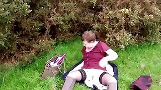 Small tits MILF Suzy Public enjoys solo masturbation and stripping outdoors